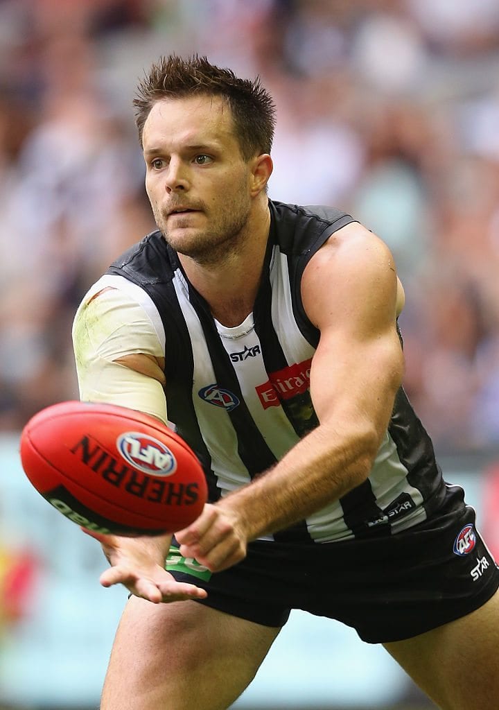 MELBOURNE, AUSTRALIA - MARCH 12: Nathan Brown of the Magpies handballs during the 2016 NAB Challenge AFL match between the Collingwood Magpies and the Western Bulldogs at Etihad Stadium on March 12, 2016 in Melbourne, Australia. (Photo by Quinn Rooney/Getty Images)