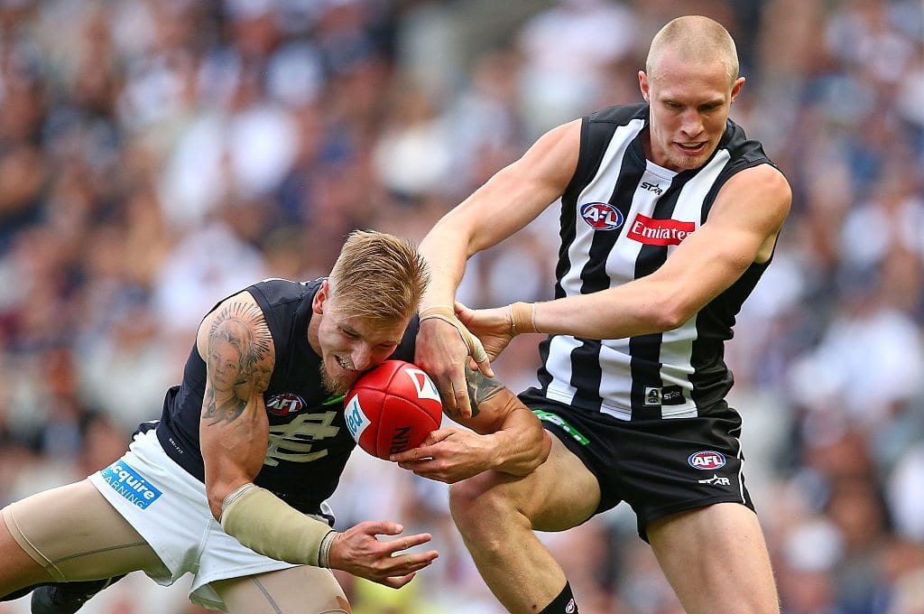 MELBOURNE, AUSTRALIA - MAY 07: Dennis Armfield of the Blues and Jack Frost of the Magpies compete for the ball during the round seven AFL match between the Collingwood Magpies and the Carlton Blues at Melbourne Cricket Ground on May 7, 2016 in Melbourne, Australia. (Photo by Scott Barbour/Getty Images)