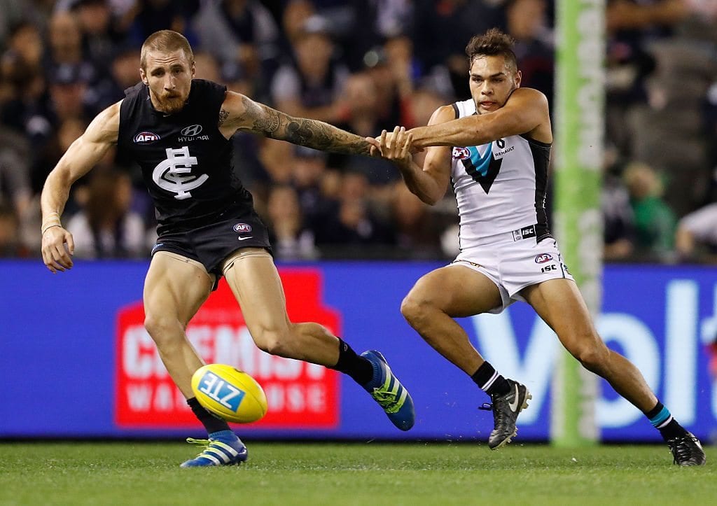 MELBOURNE, AUSTRALIA - MAY 15: Zach Tuohy of the Blues and Jarman Impey of the Power compete for the ball during the 2016 AFL Round 08 match between the Carlton Blues and Port Adelaide Power at Etihad Stadium, Melbourne on May 15, 2016. (Photo by Adam Trafford/AFL Media/Getty Images)