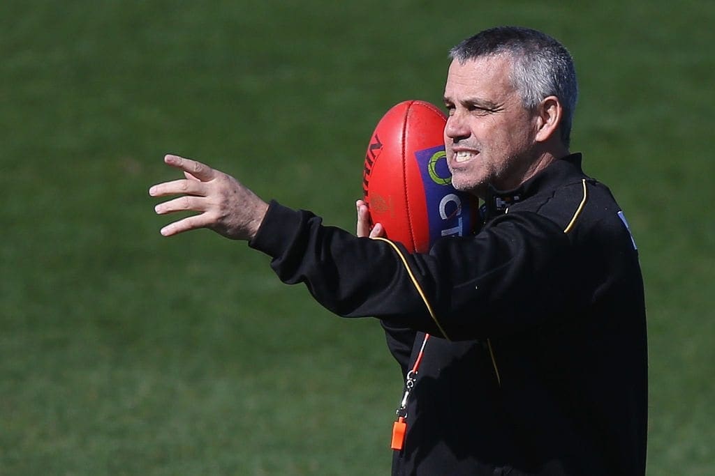 AFL premiership coach to sit in Jannik Sinner