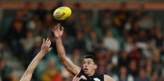 Kreuzer re-signs