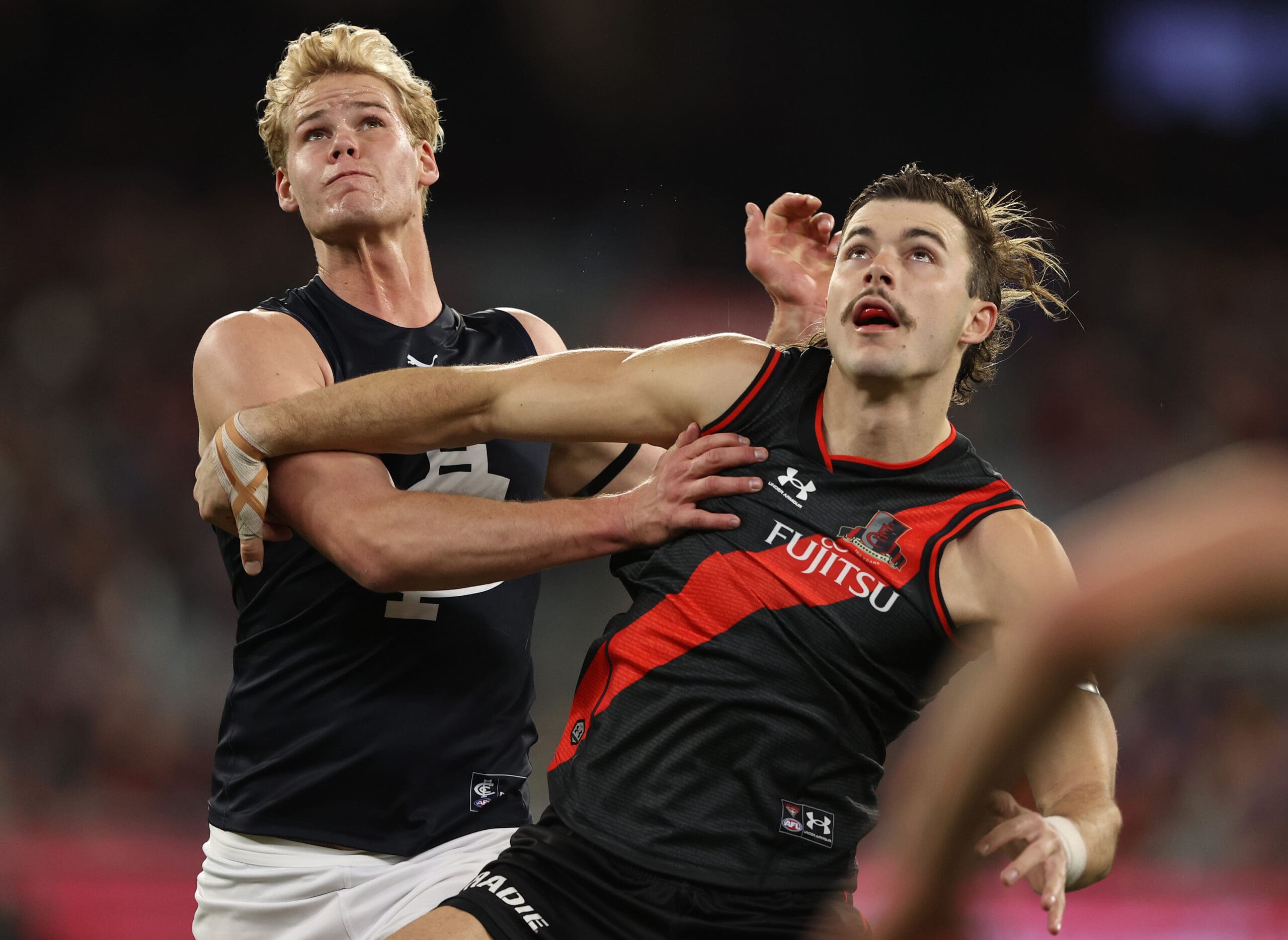 Melbourne, Australia. 02nd June, 2023. Patrick Cripps of Carlton leads teammates from the field during the AFL Round 12 match between the Melbourne Demons and the Carlton Blues at the Melbourne Cricket