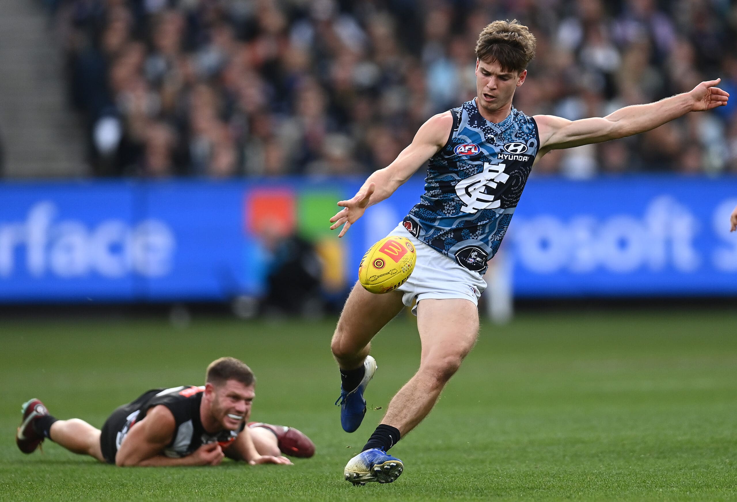 Melbourne, Australia. 02nd June, 2023. Alex Cincotta of Carlton tackles  Kysaiah Pickett of Melbourne during the AFL Round 12 match between the  Melbourne Demons and the Carlton Blues at the Melbourne Cricket