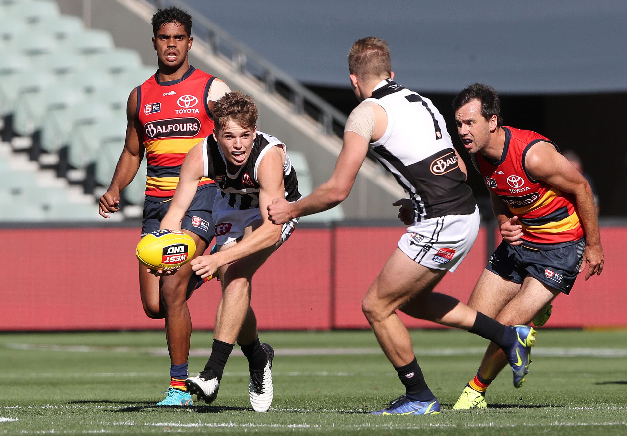 Young Port Adelaide midfielder sidelined for half the season