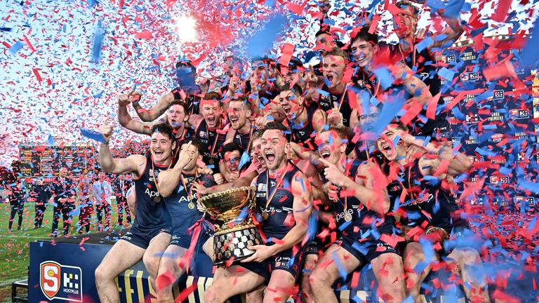 Redlegs players celebrate after winning the SANFL Grand Final match between Norwood and North Adelaide at Adelaide Oval, Sunday, September 18, 2022. (SANFL Image/Scott Starkey)