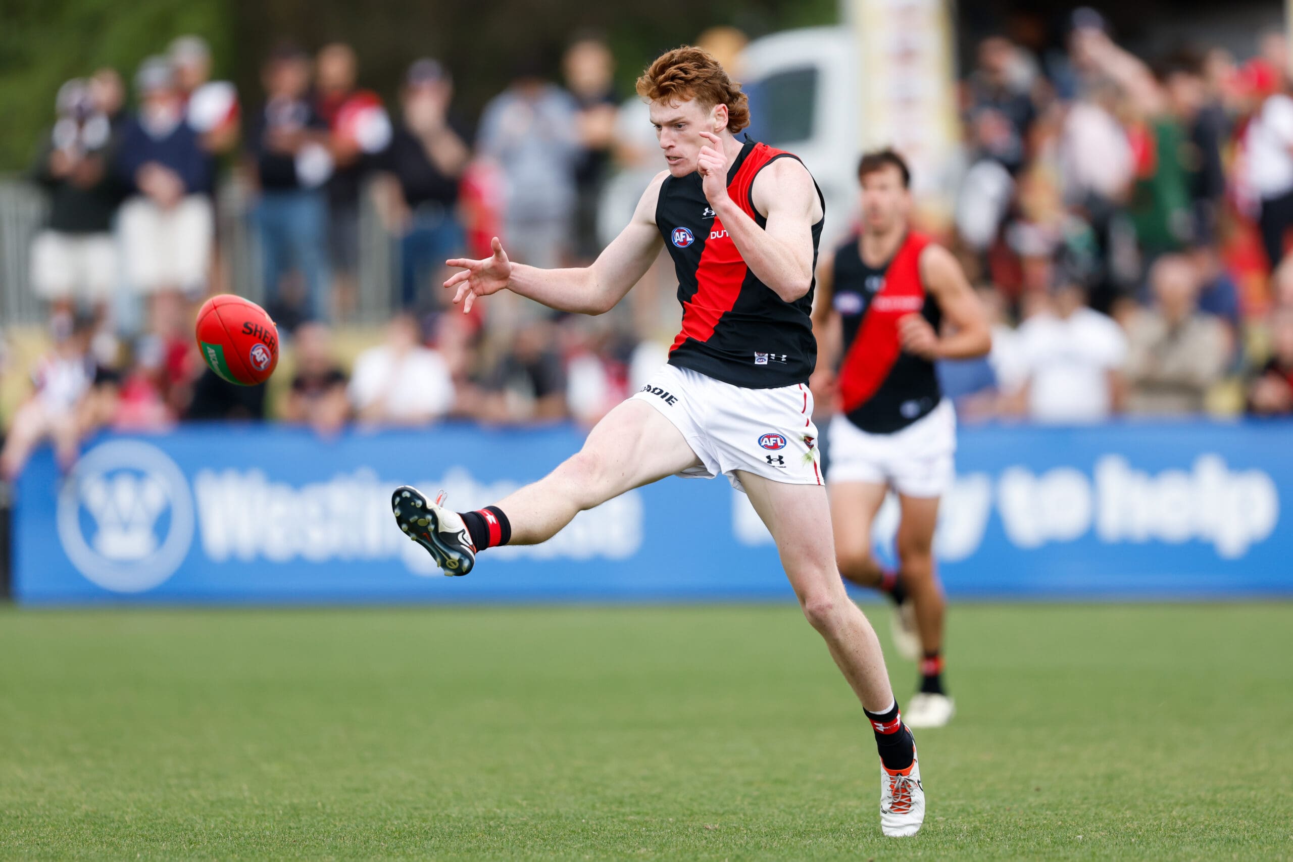 Former top 10 draft pick one of two Essendon youngsters to re-sign