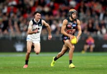 Michael Voss to reward "good form" at selection table, takes aim at shaky defence