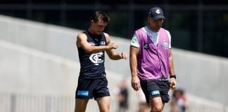 MELBOURNE, AUSTRALIA - FEBRUARY 22: Jagga Smith of the Blues limps from the field during the 2025 AFL match simulation between the Carlton Blues and St Kilda Saints at Ikon Park on February 22, 2025 in Melbourne, Australia. (Photo by Michael Willson/AFL Photos via Getty Images)