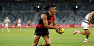 GEELONG, AUSTRALIA - FEBRUARY 25: Isaac Kako of the Bombers in action during the 2025 AFL AAMI Community Series match between the Geelong Cats and the Essendon Bombers at GMHBA Stadium on February 25, 2025 in Geelong, Australia. (Photo by Michael Willson/AFL Photos via Getty Images)