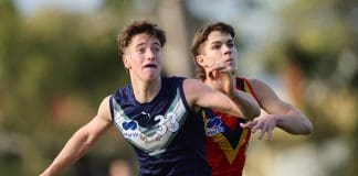 ADELAIDE, AUSTRALIA - June 30: Louis Emmett of Victoria Metro and Charlie West of South Australiaduring the 2024 Marsh AFL Championships U18 Boys match between South Australia and Victoria Metro at Alberton Oval on June 30, 2024 in Adelaide, Australia. (Photo by Sarah Reed/AFL Photos via Getty Images)