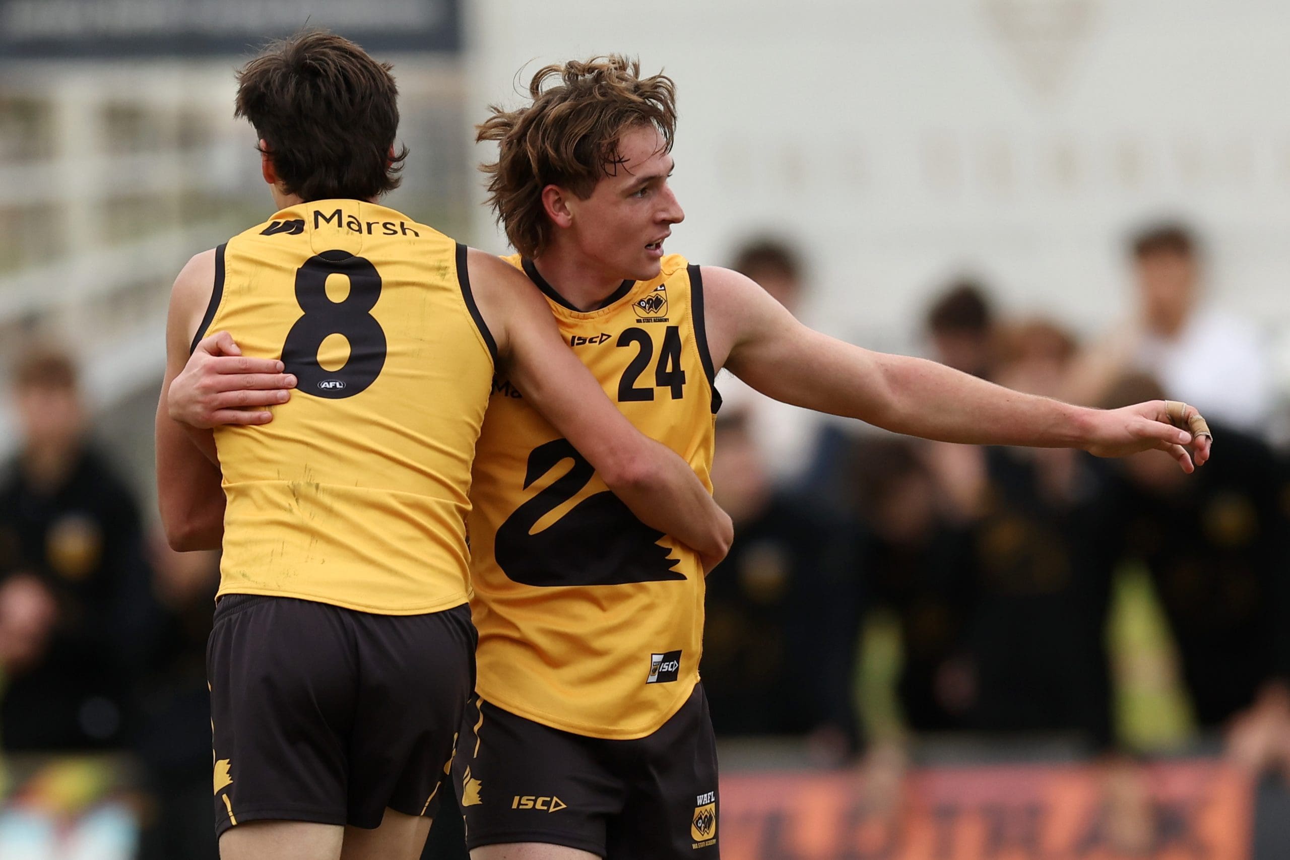 PERTH, AUSTRALIA - JUNE 29: Fred Rodriguez of Western Australia celebrates a goal with teammates during the Marsh AFL National Championships match between U18 Boys Western Australia and Victoria Country at Revo Fitness Stadium on June 29, 2024 in Perth, Australia. (Photo by Will Russell/AFL Photos/via Getty Images)