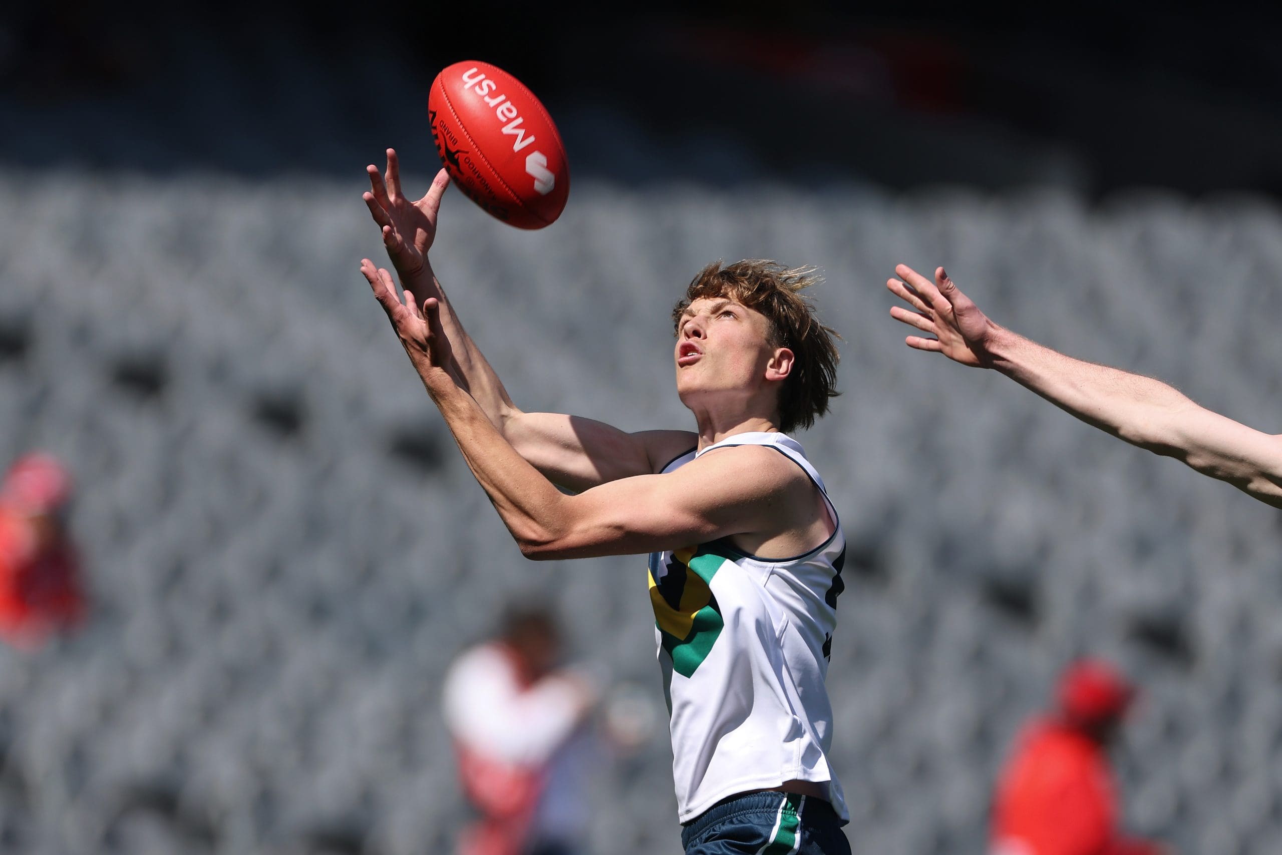 MELBOURNE, AUSTRALIA - SEPTEMBER 28: Liam Hetherton of Team Sloane marks the ball during the Marsh AFL National Futures Boys match between Team Heppell and Team Sloane at Melbourne Cricket Ground, on September 28, 2024, in Melbourne, Australia. (Photo by Daniel Pockett/AFL Photos/via Getty Images)