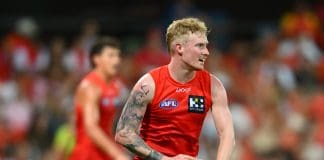 GOLD COAST, AUSTRALIA - FEBRUARY 28: John Noble of the Suns looks to kick during the 2025 AAMI AFL Community Series match between Gold Coast Suns and Sydney Swans at People First Stadium on February 28, 2025 in Gold Coast, Australia. (Photo by Matt Roberts/AFL Photos/via Getty Images)