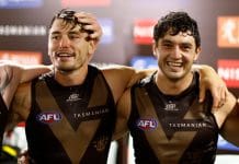 SYDNEY, AUSTRALIA - MARCH 07: Josh Battle and Tom Barrass of the Hawks sing the team song during the 2025 AFL Opening Round match between the Sydney Swans and the Hawthorn Hawks at the Sydney Cricket Ground on March 7, 2025 in Sydney, Australia. (Photo by Michael Willson/AFL Photos via Getty Images)