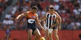 SYDNEY, AUSTRALIA - MARCH 09: Finn Callaghan of the Giants kicks the ball during the AFL Opening Round match between Greater Western Sydney Giants and Collingwood Magpies at ENGIE Stadium, on March 09, 2025, in Sydney, Australia. (Photo by Darrian Traynor/Getty Images)