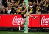 MELBOURNE, AUSTRALIA - MARCH 13: Debutant, Sam Lalor of the Tigers kicks his first league goal during the 2025 AFL Round 01 match between the Richmond Tigers and the Carlton Blues at the Melbourne Cricket Ground on March 13, 2025 in Melbourne, Australia. (Photo by Michael Willson/AFL Photos via Getty Images)