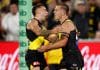 MELBOURNE, AUSTRALIA - MARCH 13: Rhyan Mansell (left) and Sam Lalor of the Tigers celebrate during the 2025 AFL Round 01 match between the Richmond Tigers and the Carlton Blues at the Melbourne Cricket Ground on March 13, 2025 in Melbourne, Australia. (Photo by Michael Willson/AFL Photos via Getty Images)