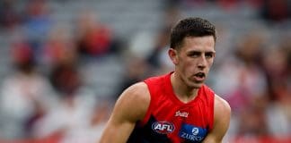 MELBOURNE, AUSTRALIA - MARCH 16: Melbourne Demons debutant Xavier Lindsay in action during the 2025 AFL Round 01 match between the Melbourne Demons and the GWS Giants at the Melbourne Cricket Ground on March 16, 2025 in Melbourne, Australia. (Photo by Dylan Burns/AFL Photos via Getty Images)