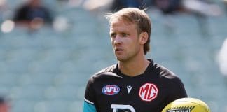 ADELAIDE, AUSTRALIA - MARCH 22: Jack Lukosius of the Power warms up during the 2025 AFL Round 02 match between the Port Adelaide Power and the Richmond Tigers at Adelaide Oval on March 22, 2025 in Adelaide, Australia. (Photo by James Elsby/AFL Photos via Getty Images)