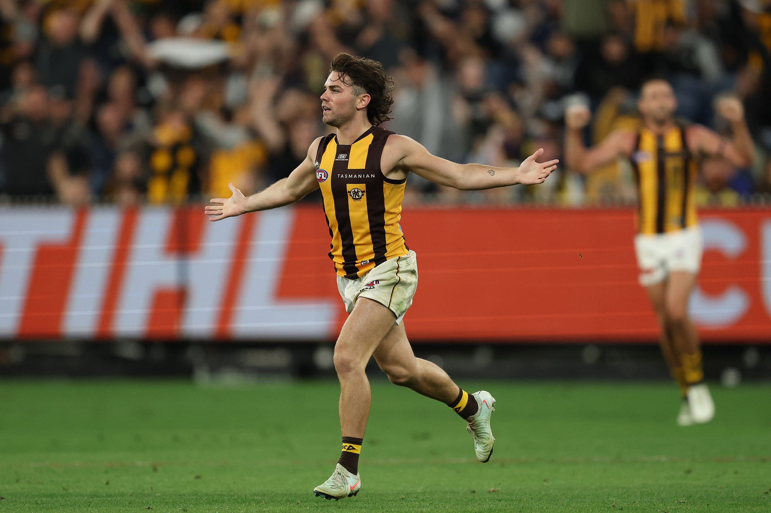 MELBOURNE, AUSTRALIA - MARCH 20: Nick Watson of the Hawks celebrates kicking a goal during the round two AFL match between Carlton Blues and Hawthorn Hawks at Melbourne Cricket Ground on March 20, 2025, in Melbourne, Australia. (Photo by Robert Cianflone/Getty Images)