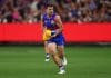 MELBOURNE, AUSTRALIA - MARCH 21: Matthew Kennedy of the Bulldogs takes possession of the ball during the round two AFL match between Footscray Bulldogs (Western Bulldogs) and Collingwood Magpies at Melbourne Cricket Ground, on March 21, 2025, in Melbourne, Australia. (Photo by Morgan Hancock/AFL Photos/Getty Images)