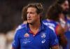 MELBOURNE, AUSTRALIA - MARCH 21: Luke Beveridge, Head Coach of the Bulldogs watches on during the round two AFL match between Footscray Bulldogs (Western Bulldogs) and Collingwood Magpies at Melbourne Cricket Ground, on March 21, 2025, in Melbourne, Australia. (Photo by Morgan Hancock/AFL Photos/Getty Images)