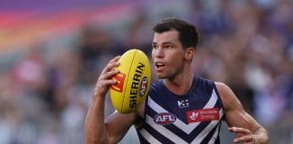 PERTH, AUSTRALIA - MARCH 23: Jaeger O'Meara of the Dockers in action during the round two AFL match between Fremantle Dockers and Sydney Swans at Perth Stadium, on March 23, 2025, in Perth, Australia. (Photo by Paul Kane/Getty Images)