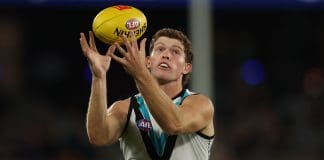 MELBOURNE, AUSTRALIA - MARCH 27: Mitch Georgiades of the Power controls the ball during the round three AFL match between Essendon Bombers and Port Adelaide Power at Marvel Stadium, on March 27, 2025, in Melbourne, Australia. (Photo by Robert Cianflone/Getty Images)