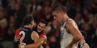 MELBOURNE, AUSTRALIA - MARCH 27: Sam Draper of the Bombers celebrates after scoring a goal during the round three AFL match between Essendon Bombers and Port Adelaide Power at Marvel Stadium, on March 27, 2025, in Melbourne, Australia. (Photo by Robert Cianflone/Getty Images)