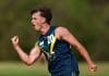 MELBOURNE, AUSTRALIA - APRIL 13: Daniel Annable of the AFL National Academy celebrates kicking a goal during the Marsh AFL National Academy Boys match between Australia U18 and Richmond VFL at RSEA Park on April 13, 2025 in Melbourne, Australia. (Photo by Josh Chadwick/AFL Photos)