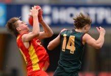 GOLD COAST, AUSTRALIA - JULY 03: Cooper Collins of Gold Coast competes for the ball against Rylee McHenry of Tasmania during the AFL National Development Championships U16 boys match between Gold Coast Suns and Tasmania at Heritage Bank Stadium on July 03, 2023 in Gold Coast, Australia. (Photo by Matt Roberts/AFL Photos/Getty Images)