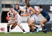 MELBOURNE, AUSTRALIA - APRIL 13: Cooper Keogh of the Coburg Lions in action during the 2024 AFL Academy match between the Marsh AFL National Academy Boys and Coburg Lions at Ikon Park on April 13, 2024 in Melbourne, Australia. (Photo by Michael Willson/AFL Photos via Getty Images)
