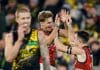 MELBOURNE, AUSTRALIA - MAY 25: Zach Merrett of the Bombers celebrates a goal with Matt Guelfi during the 2024 AFL Round 11 match between the Richmond Tigers and the Essendon Bombers at The Melbourne Cricket Ground on May 25, 2024 in Melbourne, Australia. (Photo by Dylan Burns/AFL Photos via Getty Images)
