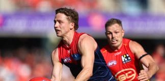 GOLD COAST, AUSTRALIA - AUGUST 17: Jack Billings of the Demons in action during the round 23 AFL match between Gold Coast Suns and Melbourne Demons at People First Stadium, on August 17, 2024, in Gold Coast, Australia. (Photo by Chris Hyde/Getty Images)