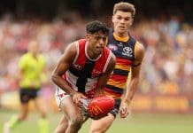 ADELAIDE, AUSTRALIA - MARCH 16: Nasiah Wanganeen-Milera of the Saints is tackled by Ben Keays of the Crows during the 2025 AFL Round 01 match between the Adelaide Crows and the St Kilda Saints at Adelaide Oval on March 16, 2025 in Adelaide, Australia. (Photo by James Elsby/AFL Photos via Getty Images)