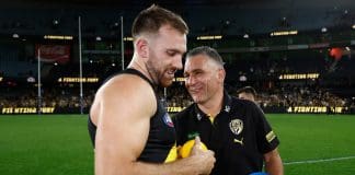 MELBOURNE, AUSTRALIA - APRIL 19: Noah Balta of the Tigers and Adem Yze, Senior Coach of the Tigers celebrates during the 2025 AFL Round 06 match between the Richmond Tigers and the Gold Coast Suns at Marvel Stadium on April 19, 2025 in Melbourne, Australia. (Photo by Michael Willson/AFL Photos via Getty Images)