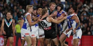 ADELAIDE, AUSTRALIA - APRIL 26: Jason Horne-Francis of the Power clashes with Jy Simpkin of the Kangaroos during the 2025 AFL Round 07 match between the Port Adelaide Power and the North Melbourne Kangaroos at Adelaide Oval on April 26, 2025 in Adelaide, Australia. (Photo by James Elsby/AFL Photos via Getty Images)