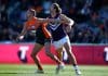 CANBERRA, AUSTRALIA - AUGUST 20: Alex Pearce of the Dockers and Jesse Hogan of the Giants compete for the ball during the round 23 AFL match between the Greater Western Sydney Giants and the Fremantle Dockers at Manuka Oval on August 20, 2022 in Canberra, Australia. (Photo by Jason McCawley/AFL Photos/via Getty Images)