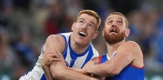 MELBOURNE, AUSTRALIA - JUNE 29: Toby Pink of the Kangaroos and Liam Jones of the Bulldogs compete during the round 16 AFL match between North Melbourne Kangaroos and Western Bulldogs at Marvel Stadium, on June 29, 2024, in Melbourne, Australia. (Photo by Daniel Pockett/Getty Images)