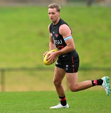 MELBOURNE, AUSTRALIA - JULY 16: Darcy Parish of the Bombers in action during an Essendon Bombers AFL training session at The Hangar on July 16, 2024 in Melbourne, Australia. (Photo by Daniel Pockett/Getty Images)