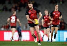 MELBOURNE, AUSTRALIA - JULY 27: Jayden Laverde of the Bombers warms up during the 2024 AFL Round 20 match between the St Kilda Saints and the Essendon Bombers at Marvel Stadium on July 27, 2024 in Melbourne, Australia. (Photo by Michael Willson/AFL Photos via Getty Images)