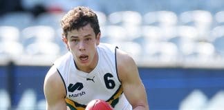 MELBOURNE, AUSTRALIA - SEPTEMBER 28: Samuel Grlj of Team Sloane looks to pass the ball during the Marsh AFL National Futures Boys match between Team Heppell and Team Sloane at Melbourne Cricket Ground, on September 28, 2024, in Melbourne, Australia. (Photo by Daniel Pockett/AFL Photos/via Getty Images)