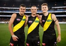 MELBOURNE, AUSTRALIA - MARCH 13: Richmond debutants Harry Armstrong, Sam Lalor and Luke Trainor pose for a photo after a win during the 2025 AFL Round 01 match between the Richmond Tigers and the Carlton Blues at the Melbourne Cricket Ground on March 13, 2025 in Melbourne, Australia. (Photo by Dylan Burns/AFL Photos via Getty Images)
