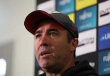 MELBOURNE, AUSTRALIA - APRIL 09: Bombers coach Brad Scott speaks to the media during an Essendon Bombers AFL training session at The Hangar on April 09, 2025 in Melbourne, Australia. (Photo by Robert Cianflone/Getty Images)