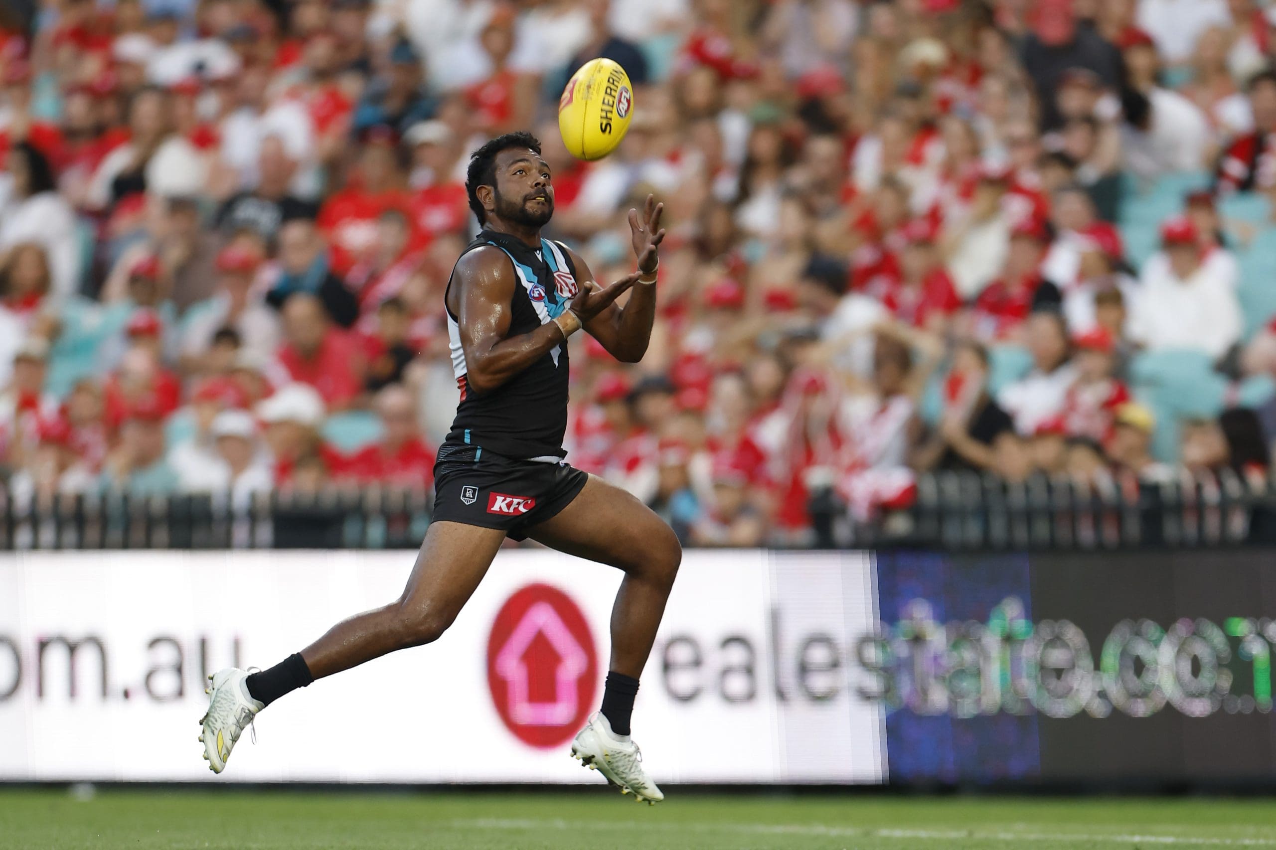 SYDNEY, AUSTRALIA - APRIL 20: Willie Rioli of the Power marks the ball during the round six AFL match between Sydney Swans and Port Adelaide Power at Sydney Cricket Ground, on April 20, 2025, in Sydney, Australia. (Photo by Darrian Traynor/AFL Photos/via Getty Images)