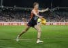 CANBERRA, AUSTRALIA - APRIL 26: Lachie Whitfield of the Giants kicks the ball during the round seven AFL match between GWS Giants and Western Bulldogs at Manuka Oval, on April 26, 2025, in Canberra, Australia. (Photo by Darrian Traynor/Getty Images)
