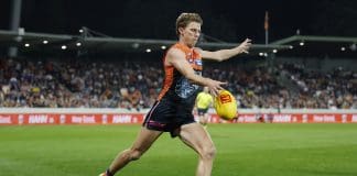 CANBERRA, AUSTRALIA - APRIL 26: Lachie Whitfield of the Giants kicks the ball during the round seven AFL match between GWS Giants and Western Bulldogs at Manuka Oval, on April 26, 2025, in Canberra, Australia. (Photo by Darrian Traynor/Getty Images)