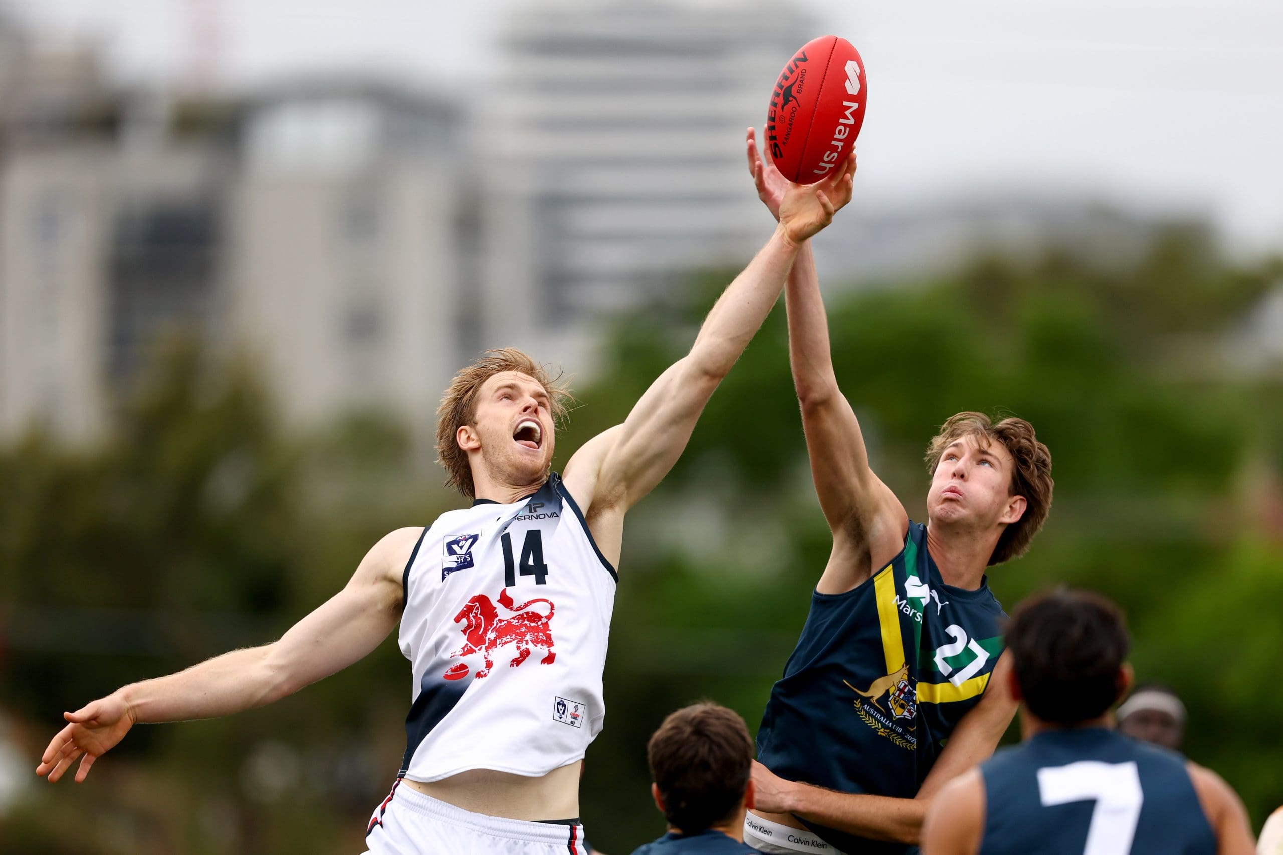 MELBOURNE, AUSTRALIA - APRIL 27: Liam Podhajski of Coburg and Taj Murray of the AFL National Academy compete in the ruck during the Marsh AFL National Academy Boys match between Australia U18 and Coburg VFL at Whitten Oval on April 27, 2025 in Melbourne, Australia. (Photo by Josh Chadwick/AFL Photos/via Getty Images)