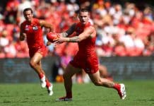 GOLD COAST, AUSTRALIA - APRIL 27: Bailey Humphrey of the Suns kicks during the round seven AFL match between Gold Coast Suns and Sydney Swans at People First Stadium, on April 27, 2025, in Gold Coast, Australia. (Photo by Chris Hyde/Getty Images)