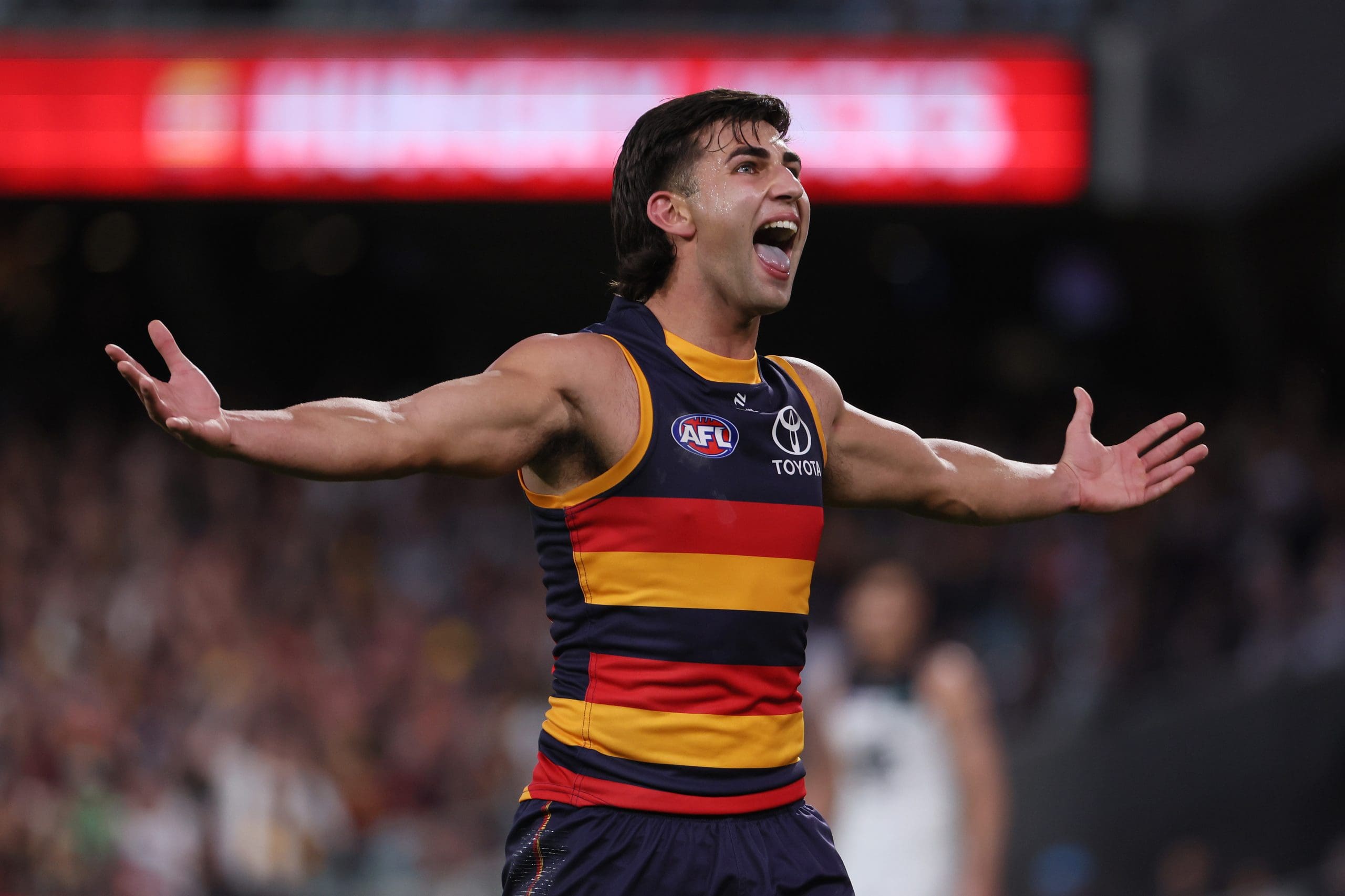 ADELAIDE, AUSTRALIA - MAY 03: Josh Rachele of the Crows celebrates a goal during the 2025 AFL Round 08 match between the Adelaide Crows and the Carlton Blues at Adelaide Oval on May 3, 2025 in Adelaide, Australia. (Photo by James Elsby/AFL Photos via Getty Images)